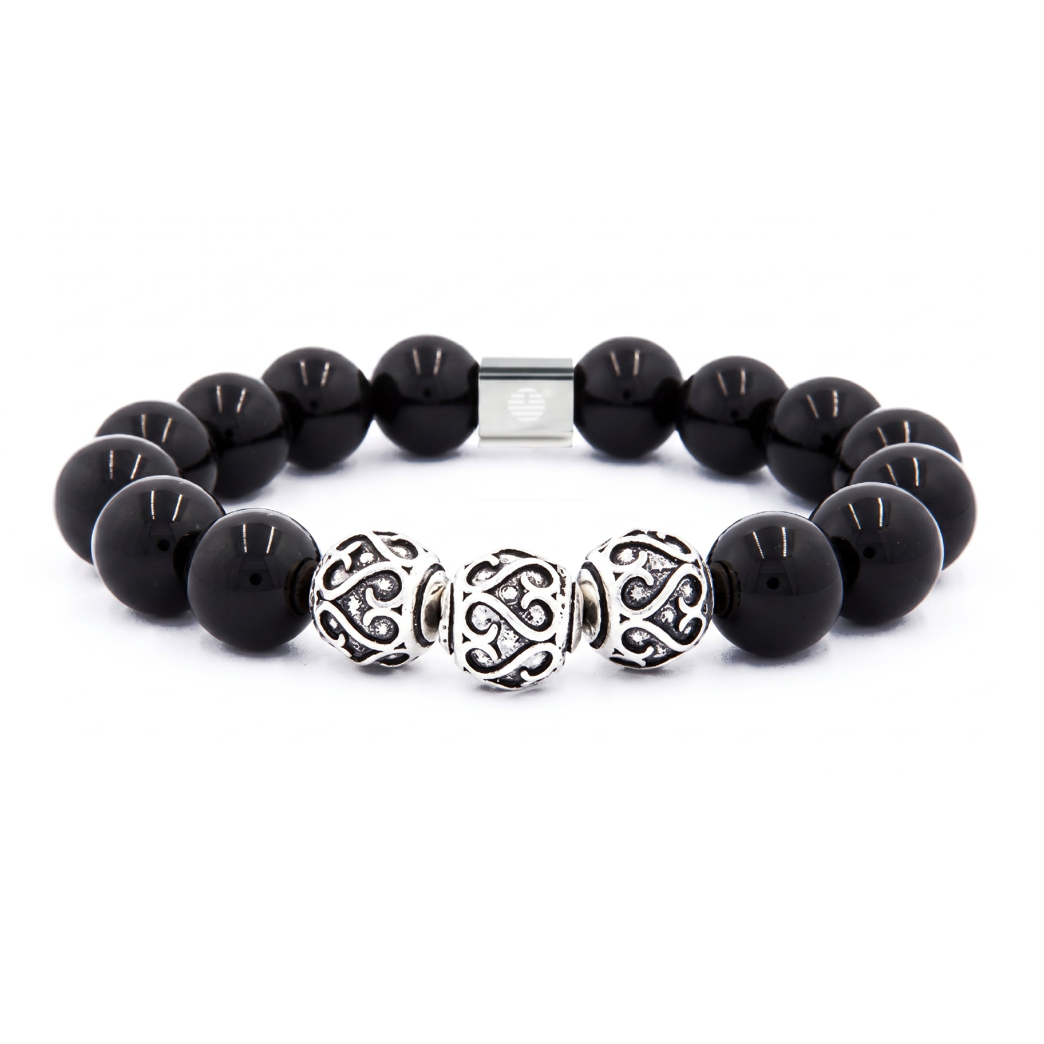 A beaded bracelet featuring glossy black round beads, three ornate silver Celtic knot style spacer beads, and a silver magnetic clasp, shown on a plain white background.
